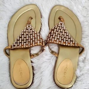 BEBE BEJEWELED LEATHER SANDAL GOLD
